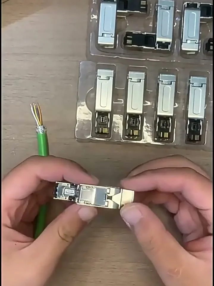 The RJ45 field-wireable connector as supplied, before opening.